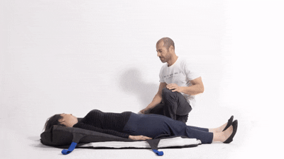 FloorRiser battery-powered floor lift device with support straps