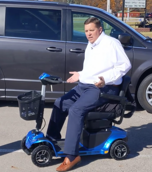 Customer using SitnStand device