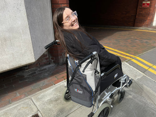Customer using SitnStand device